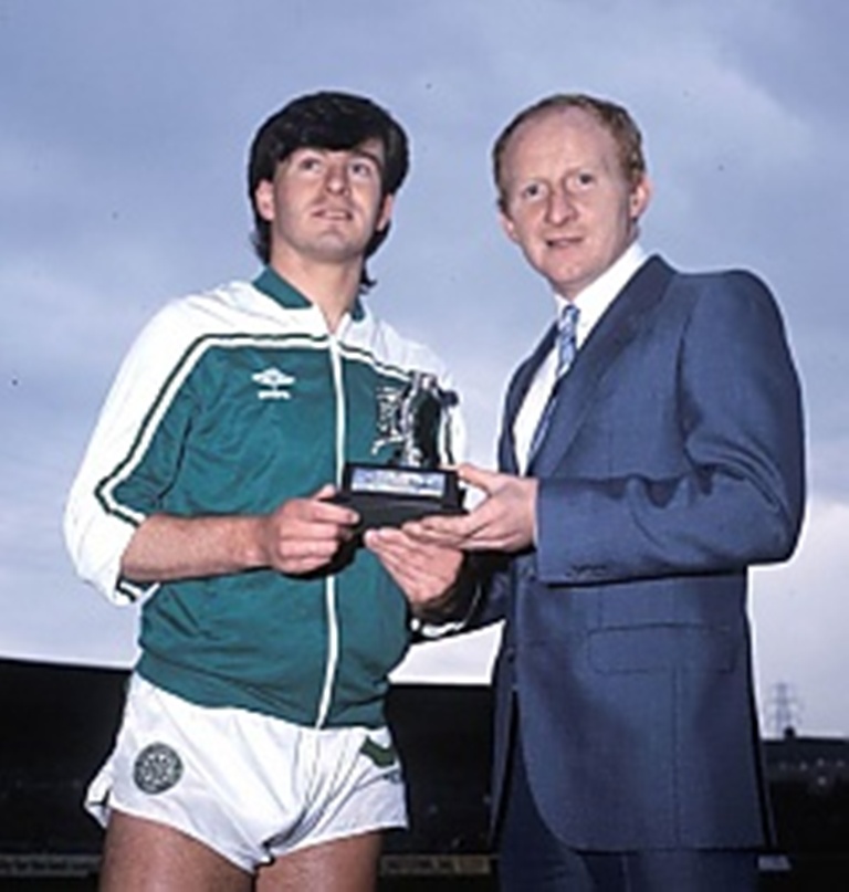 Jinky presents an award to Nicholas 1983