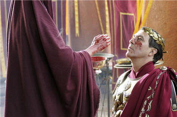 Caesar getting his face painted red Caesar getting his face painted red