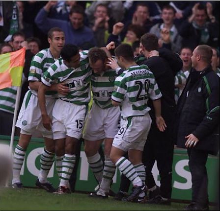 Valgeren is swamped after goal v Rangers 2001