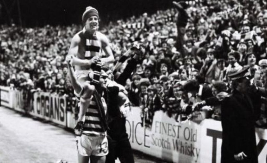 Burns is raised high at Tannadice 1981