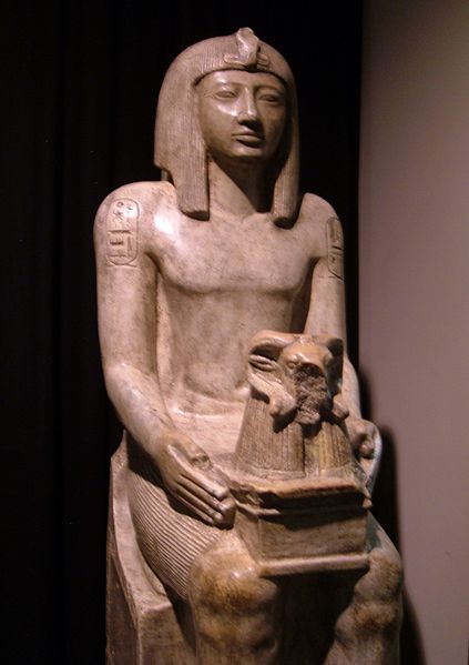 Seti II - holding a shrine to the god Amun Seti II - holding a shrine to the god Amun