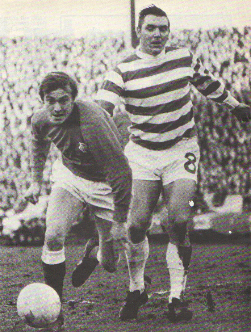 Bobby Murdoch and Colin Stein fight for possession