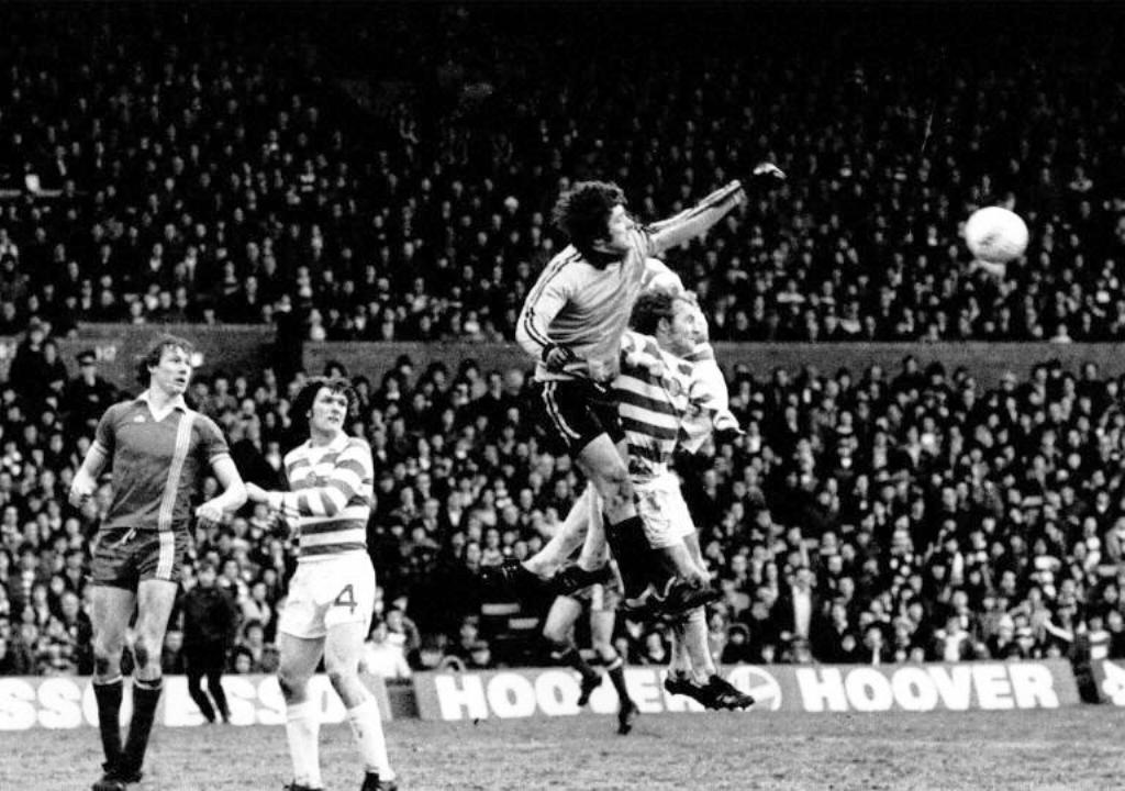 Clark punches clear from Doyle 1979