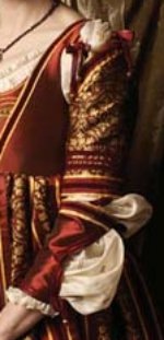 Sleeve detail of costume to the left. Sleeve detail of costume to the left.